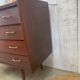 Chest of drawers with tapered feet