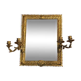 Golden bronze mirror with appliques