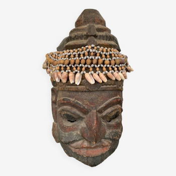 Ancient mask with its shell headdress