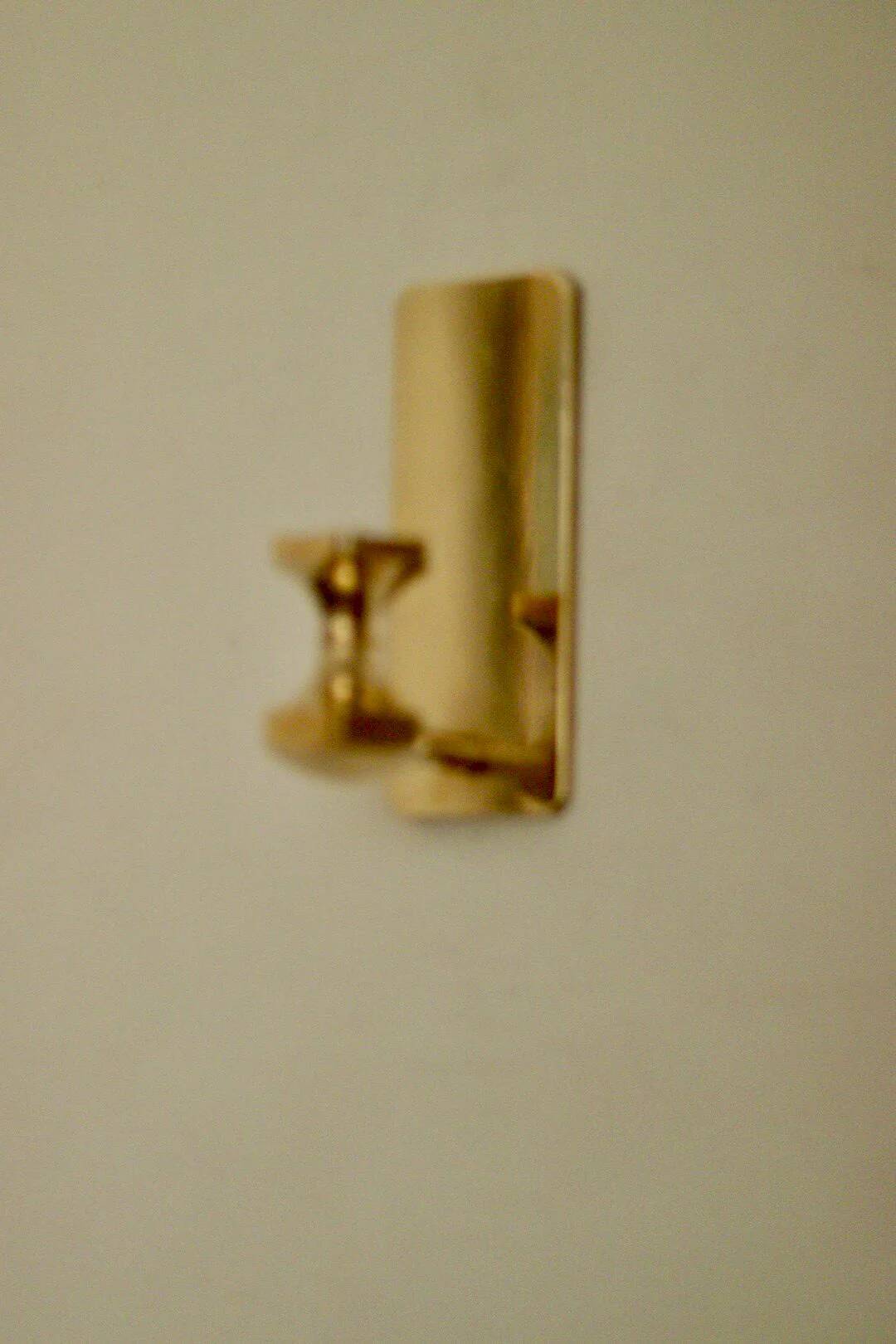 1988, single mid-century Swedish brass sconce by Gusum