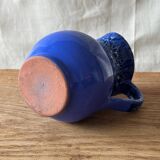 Small blue pitcher
