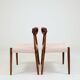 Set of two dining chairs in Scandinavian design.