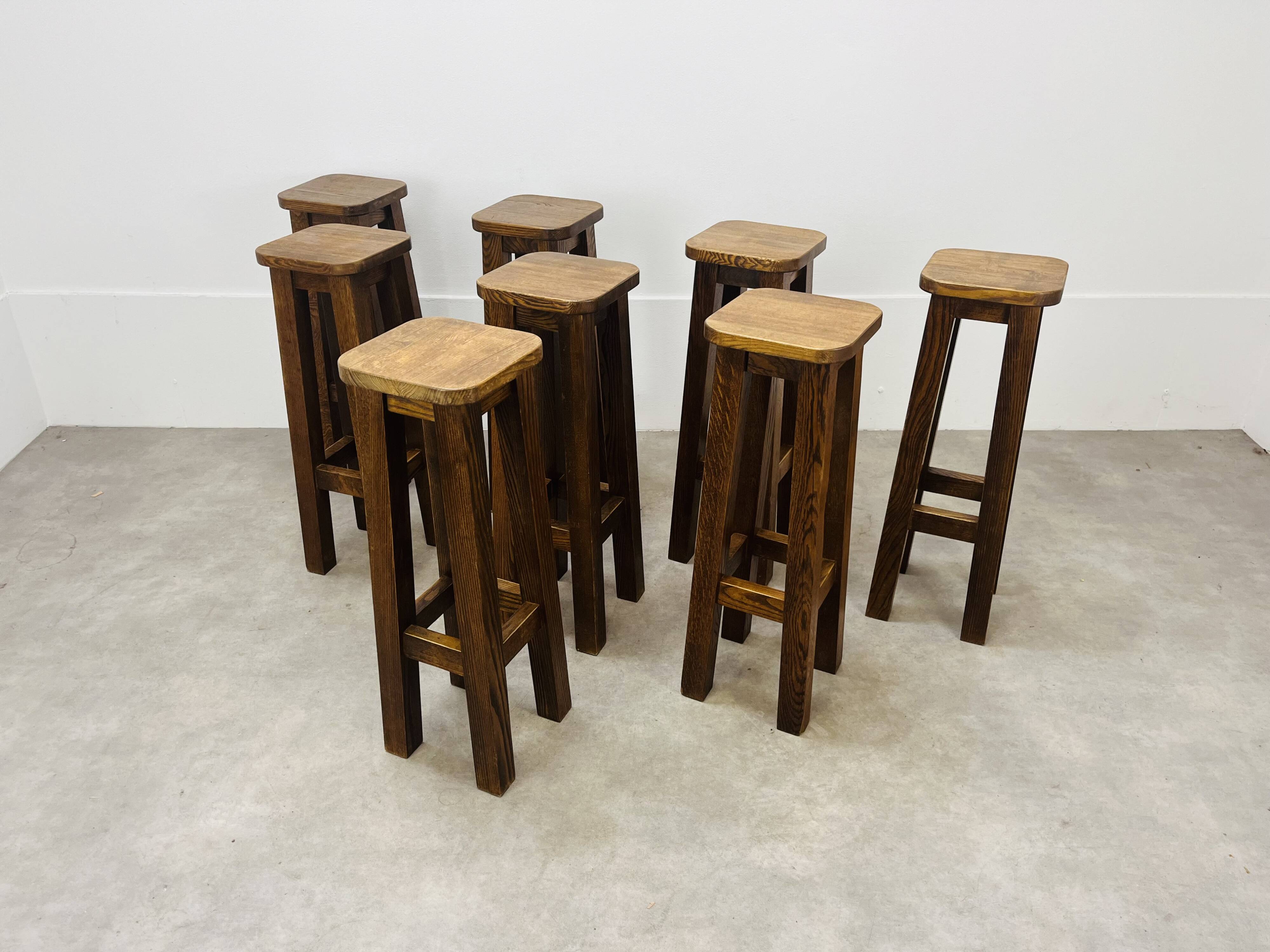 8 solid wood bar stools in brutalist style