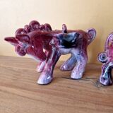 Max Idlas (1932-2020) - Pair of horses carrying a basket on each side - In pink ceramic