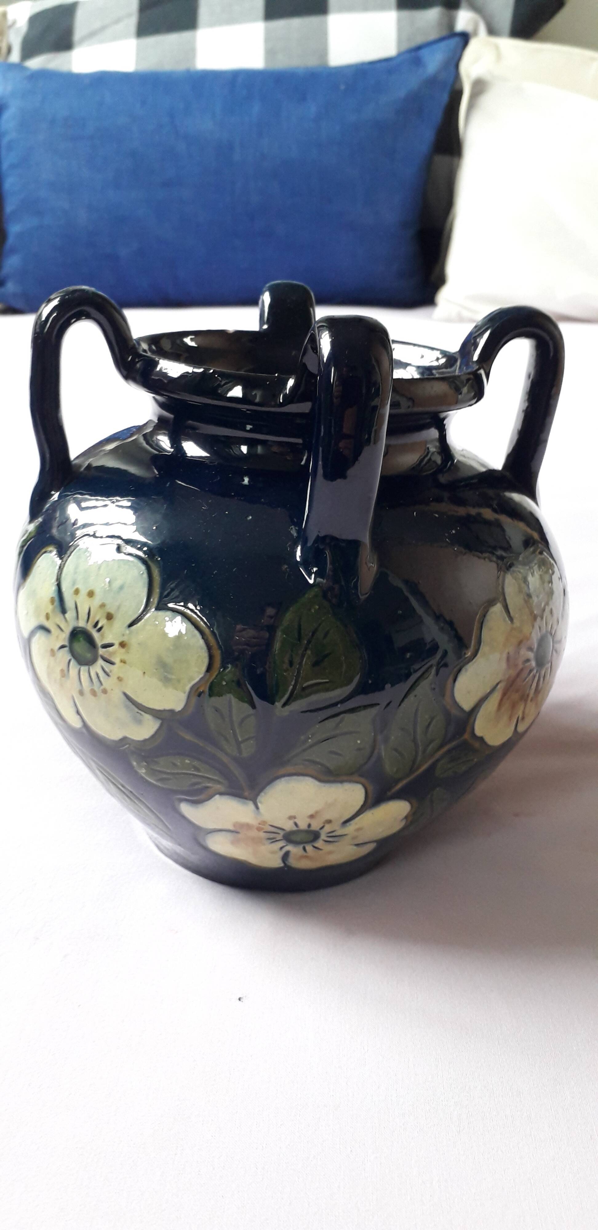 Antique Art Nouveau vase with floral decoration.