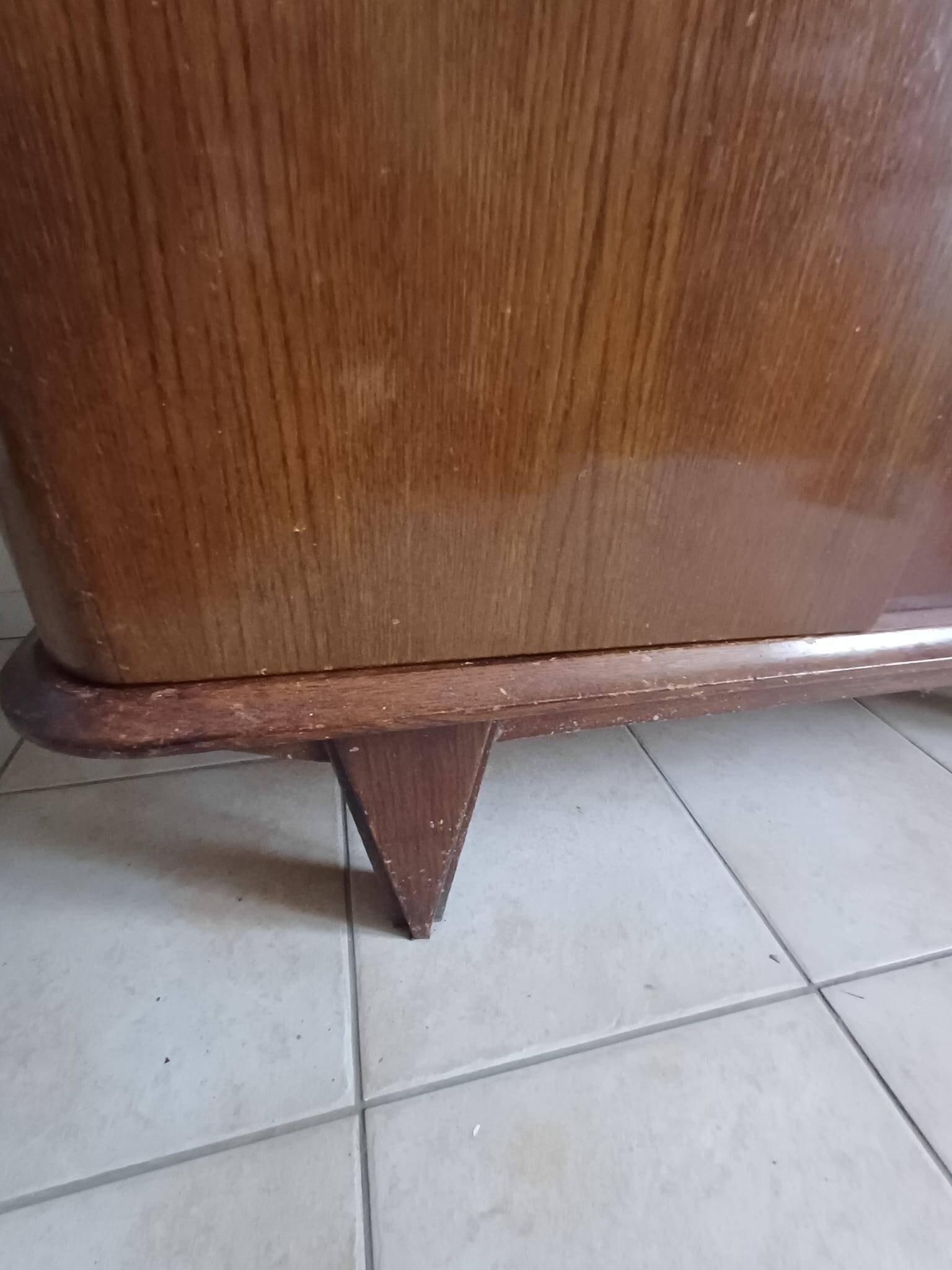 Vintage 1960s wooden wardrobe with a central mirror and tapered legs.