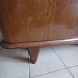 Vintage 1960s wooden wardrobe with a central mirror and tapered legs.