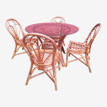 Rattan dining table and smoked glass