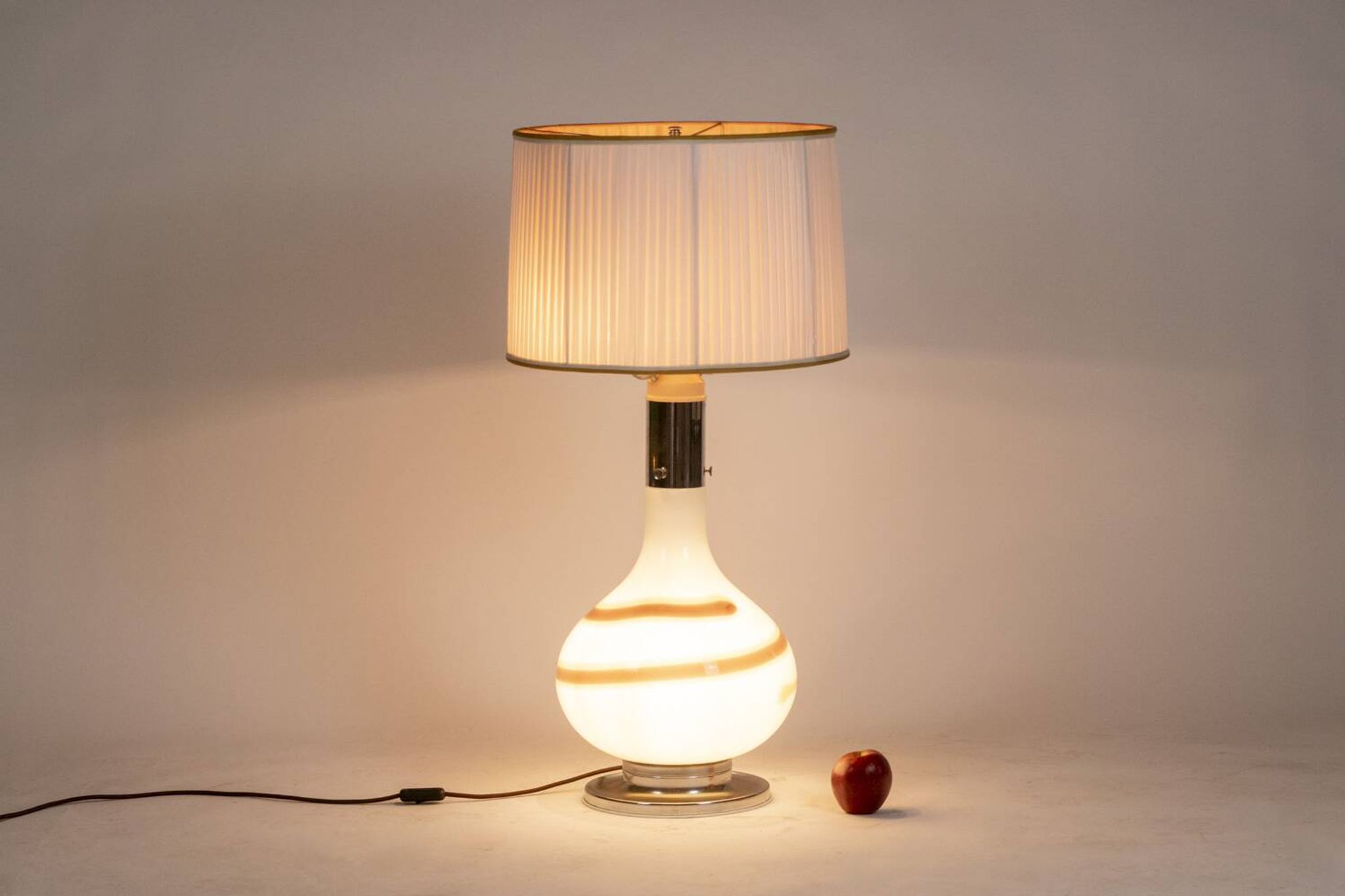 White glass lamp decorated with a brown and yellow spiral, 1970s