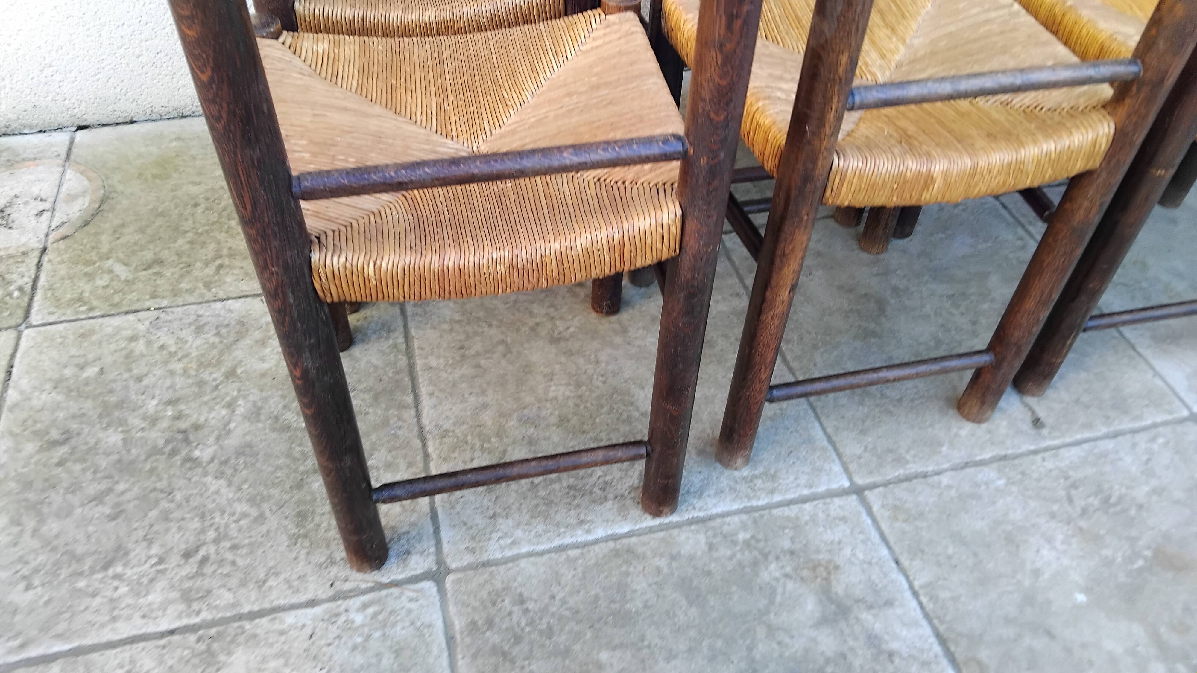 8 vintage straw chairs from the 1950s.