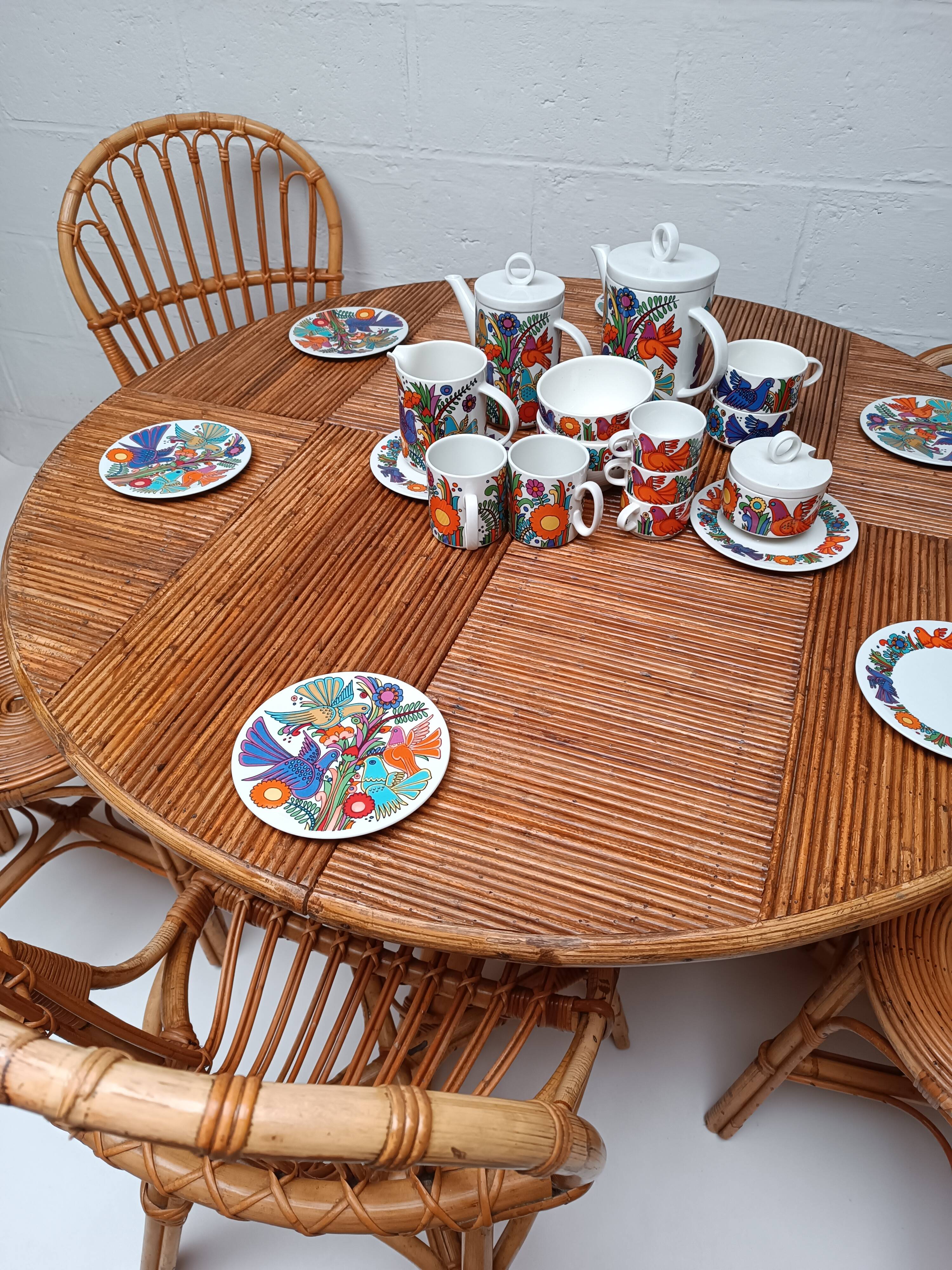 Bamboo table with extensions, 3 chairs and 3 stools from the 1960s.
