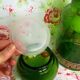 Green glass apothecary flask and golden edars old pot
