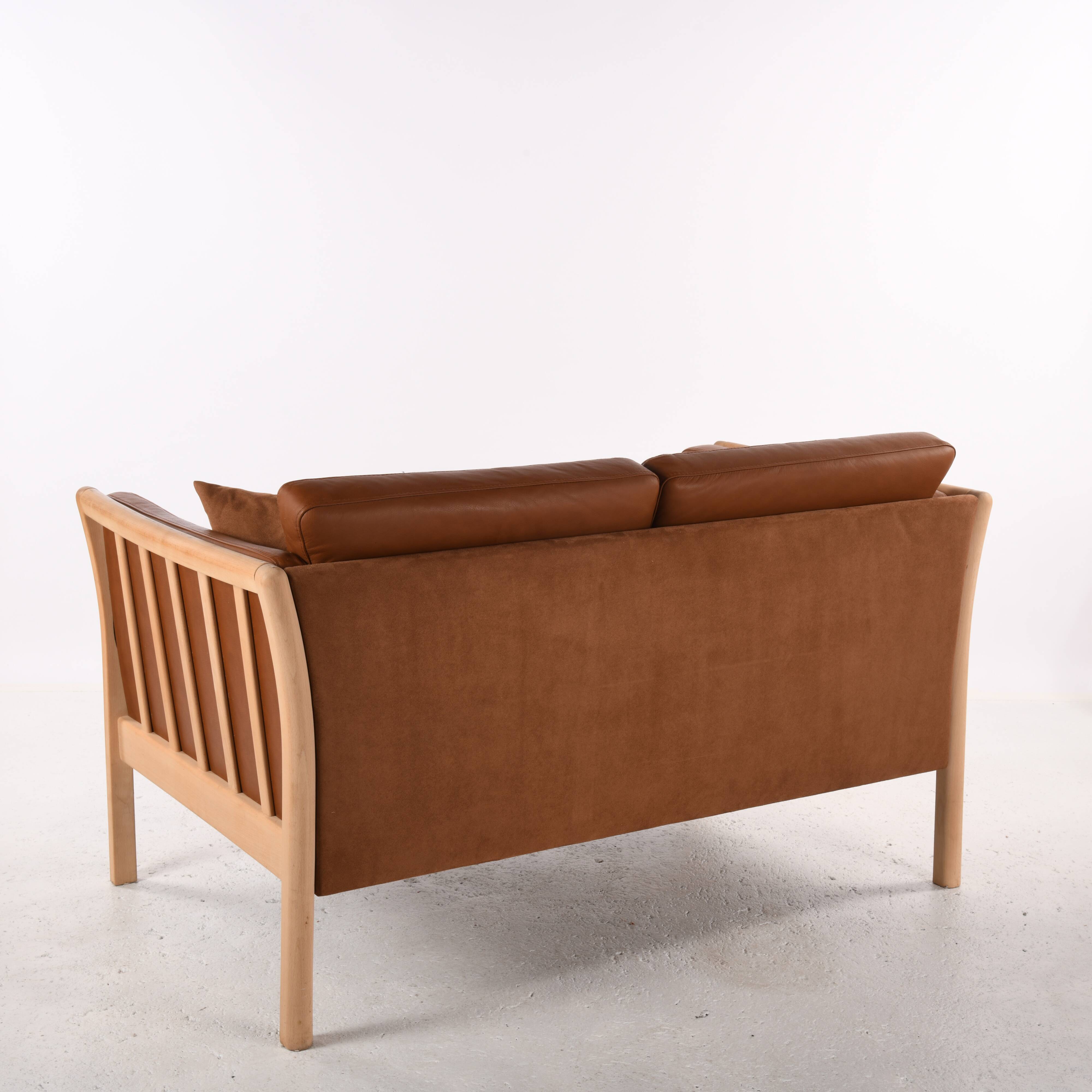 Scandinavian 2-seater leather sofa