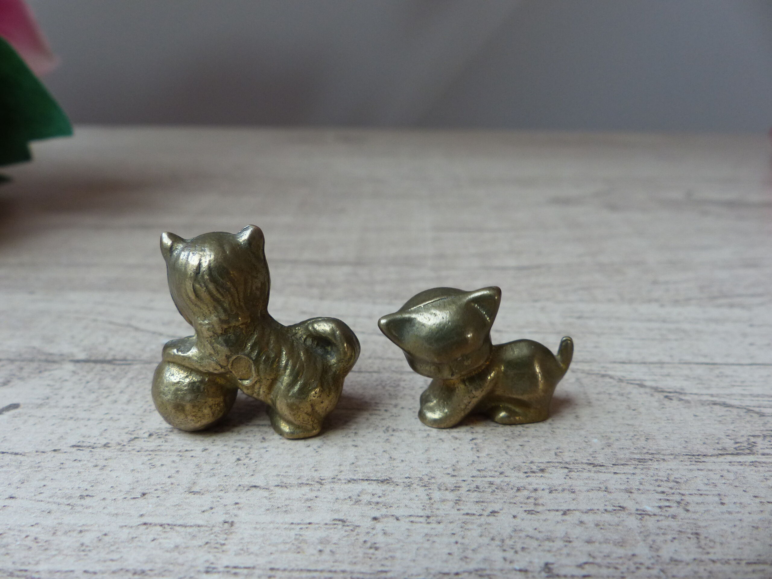 Duo of brass cats