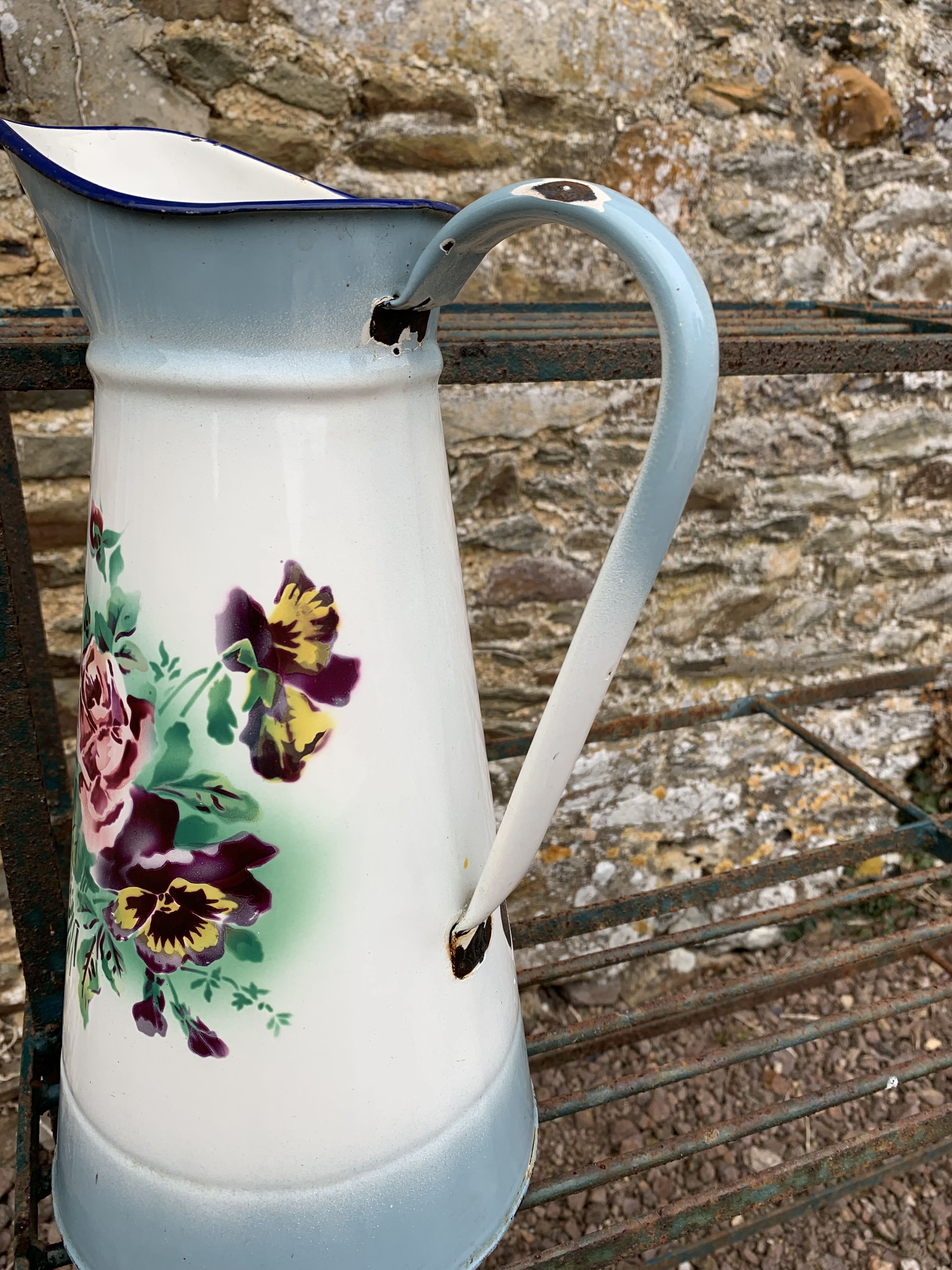 Enamelled broc with floral decoration