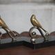 Vintage bookends, brass bird on black marble base, brass animals