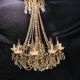 Chandelier in crystal and gilded bronze