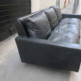 Leather sofa of the 70s footing in chrome