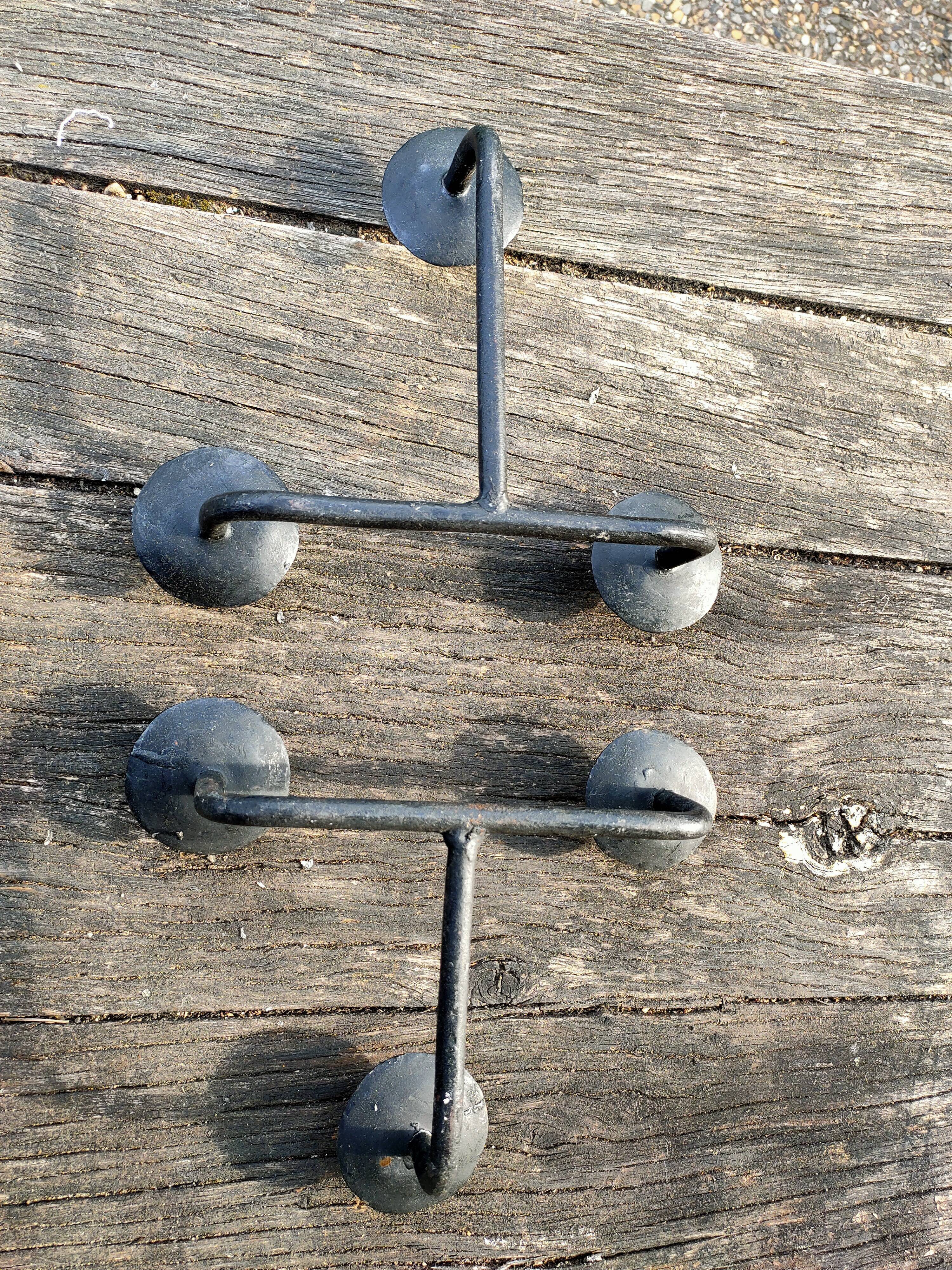 Brutalist cast iron candle holders.