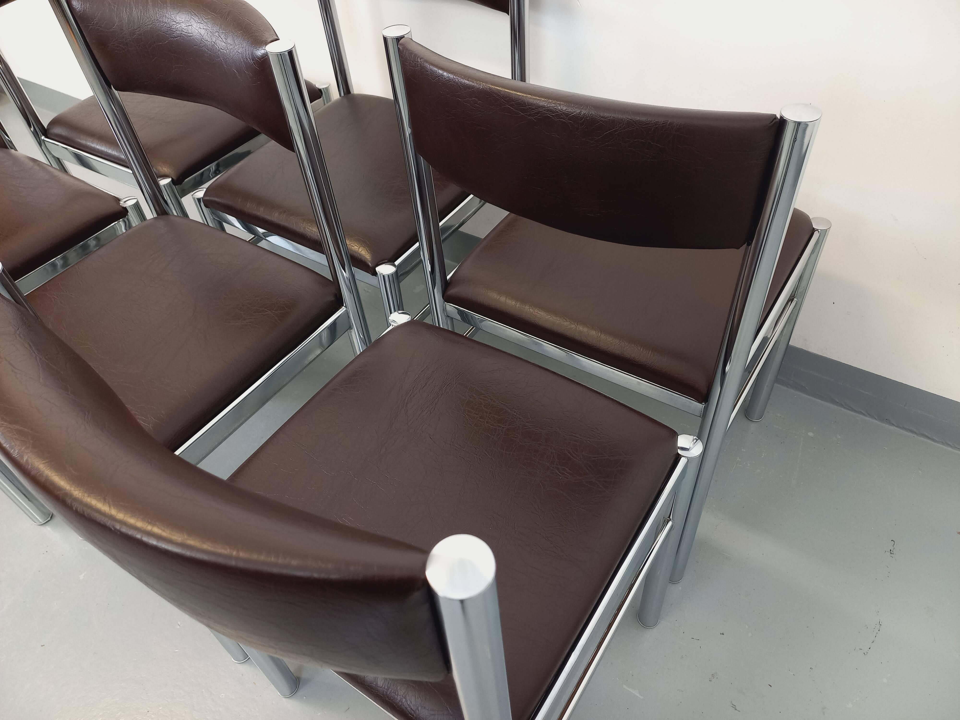 Set of 6 vintage chairs from the 70s in chrome metal and brown faux leather.