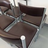 Set of 6 vintage chairs from the 70s in chrome metal and brown faux leather.