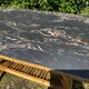Table basse vintage en rotin et Formica