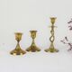 Trio of brass candle holders, vintage
