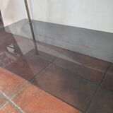 Smoked glass and brass coffee table from the 1970s.