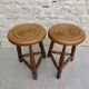 Pair of solid wood tripod stools, carved.