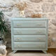 Compass feet chest of drawers