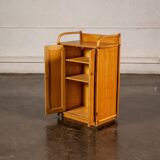 Small storage unit in cane and wood.