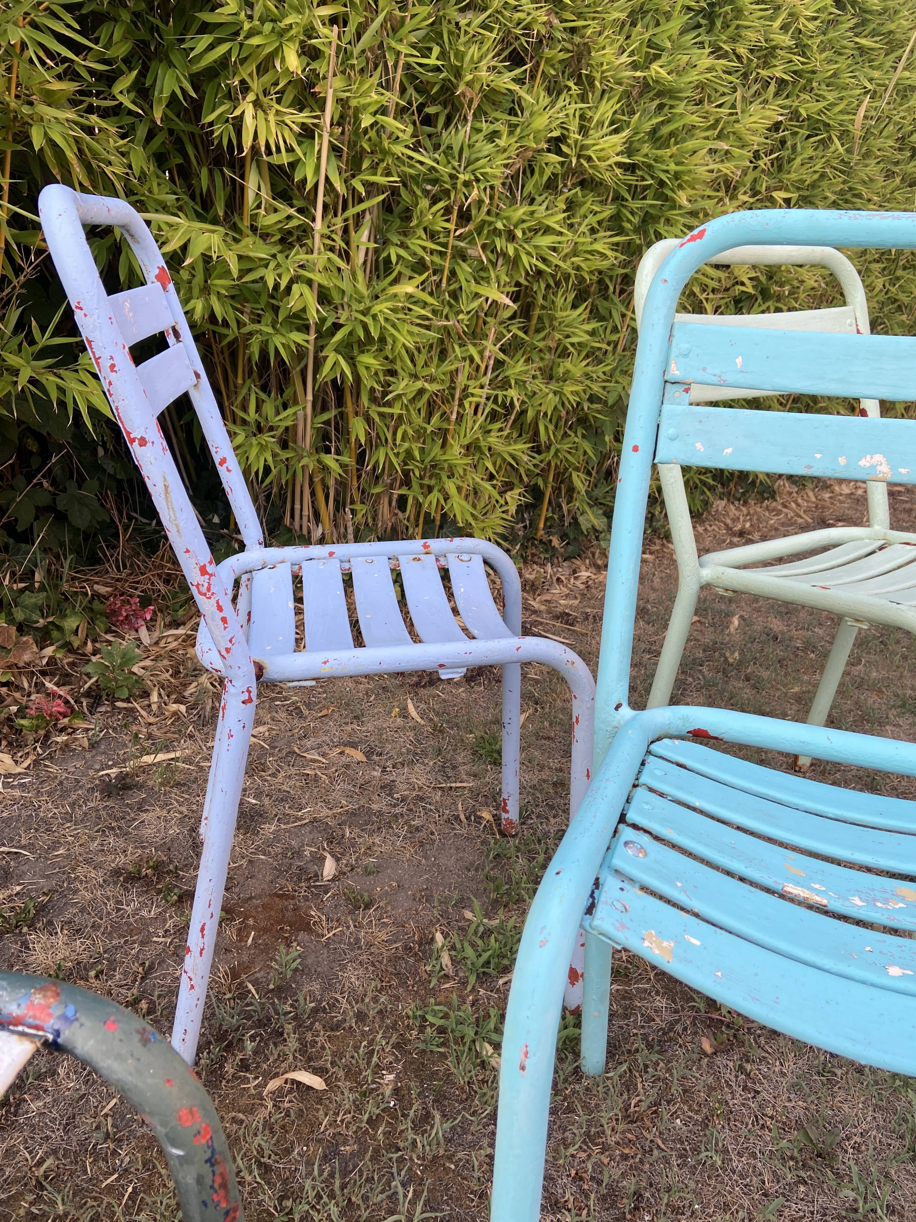 4 mismatched chairs Tolix brasserie bistro terrace French bistro 60s
