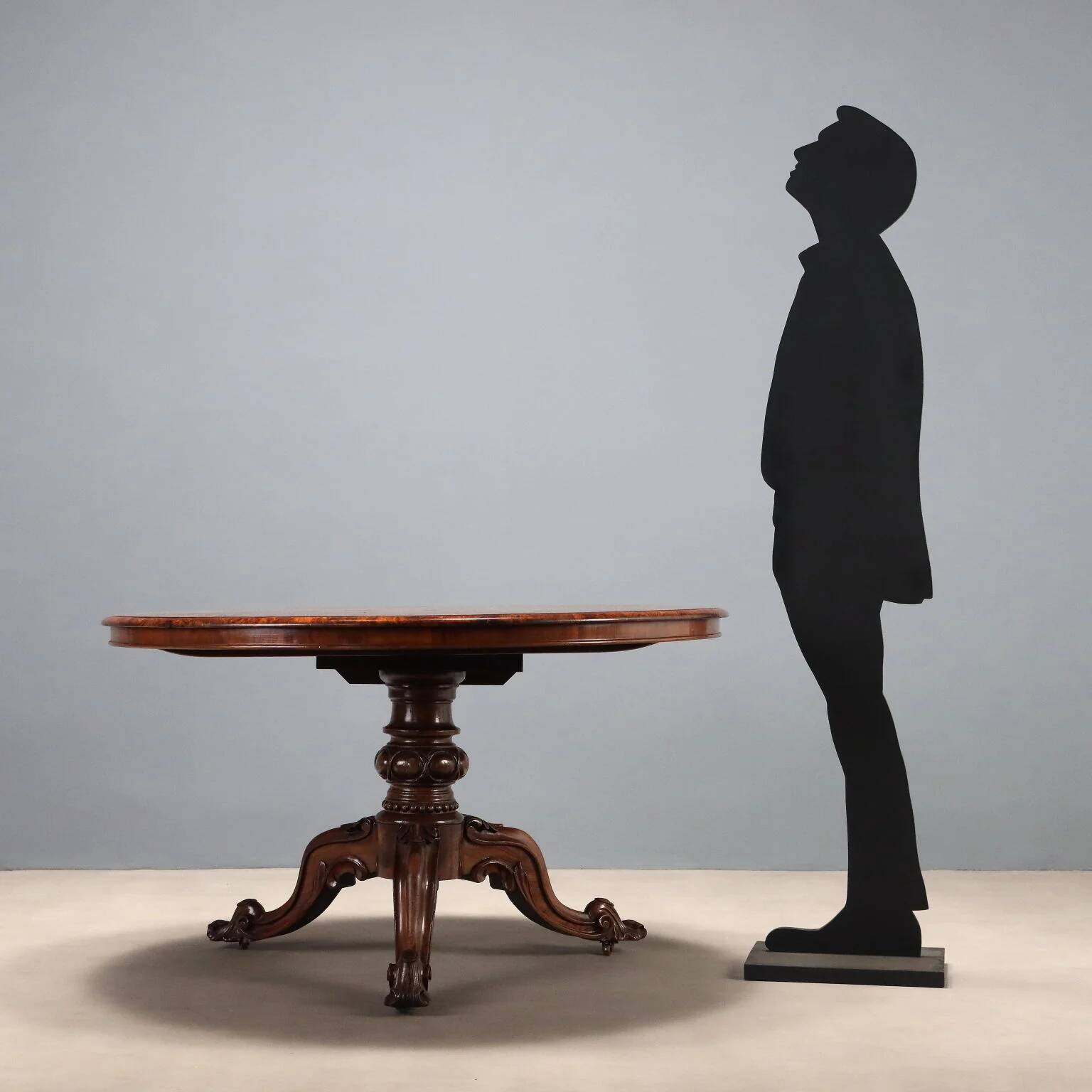 Antique walnut and rosewood table with floral inlays, Netherlands, 19th century.