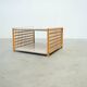 Table basse en travertin et en rotin