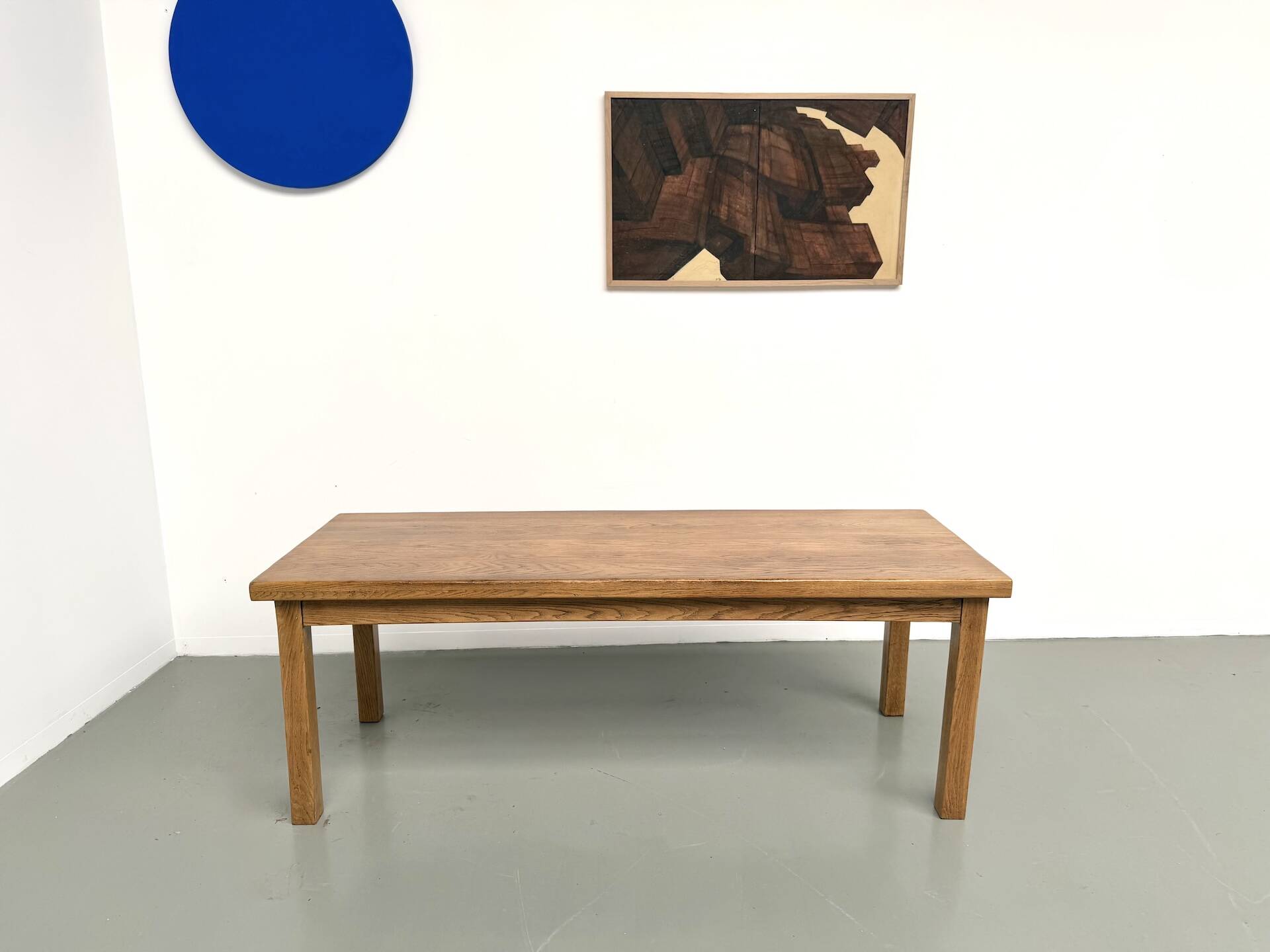 Solid oak farmhouse table, square legs.