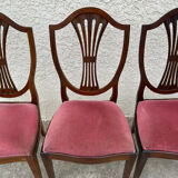 Set of 6 wooden chairs sitting red