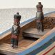 Wooden basin barque from the brand Giraud Sauveur with 2 sailors.