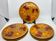 St Clément plates in French slip, orange and red decor Vintage