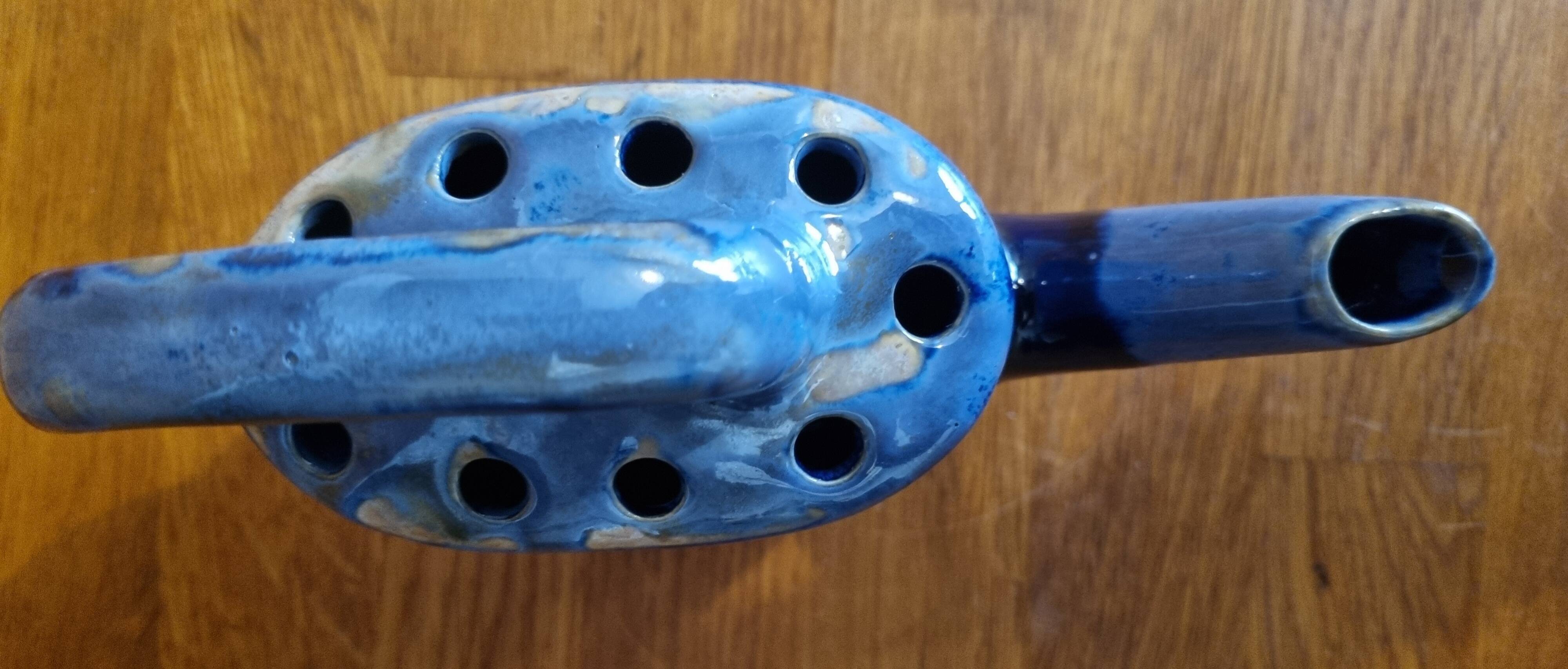 Blue flamed stoneware watering can flower stand