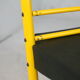 Adjustable seat chair. Circa 1980. Italy. Yellow lacquered steel.
