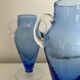 Paire de vases en verre bleu glacier