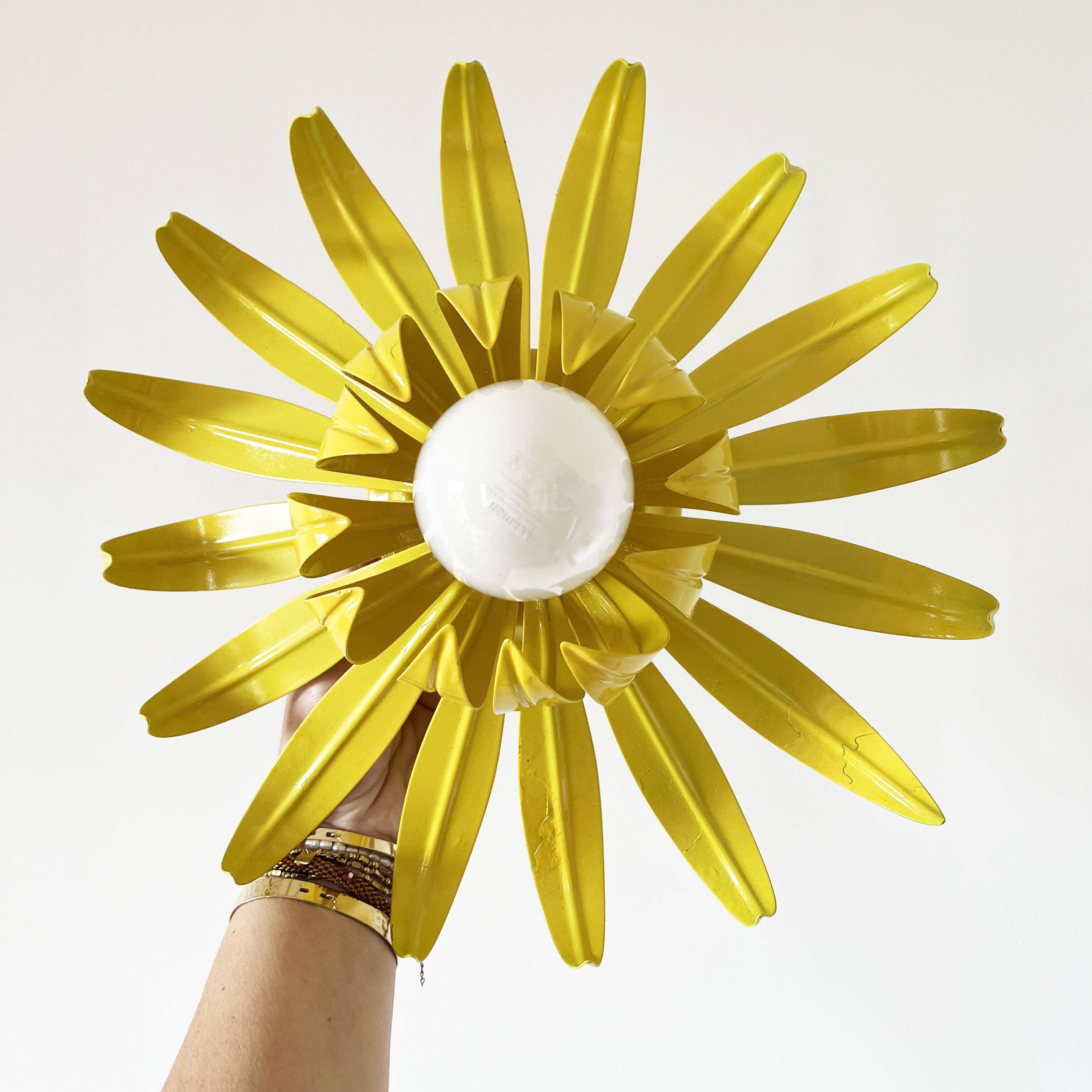 Vintage yellow metal flower wall light