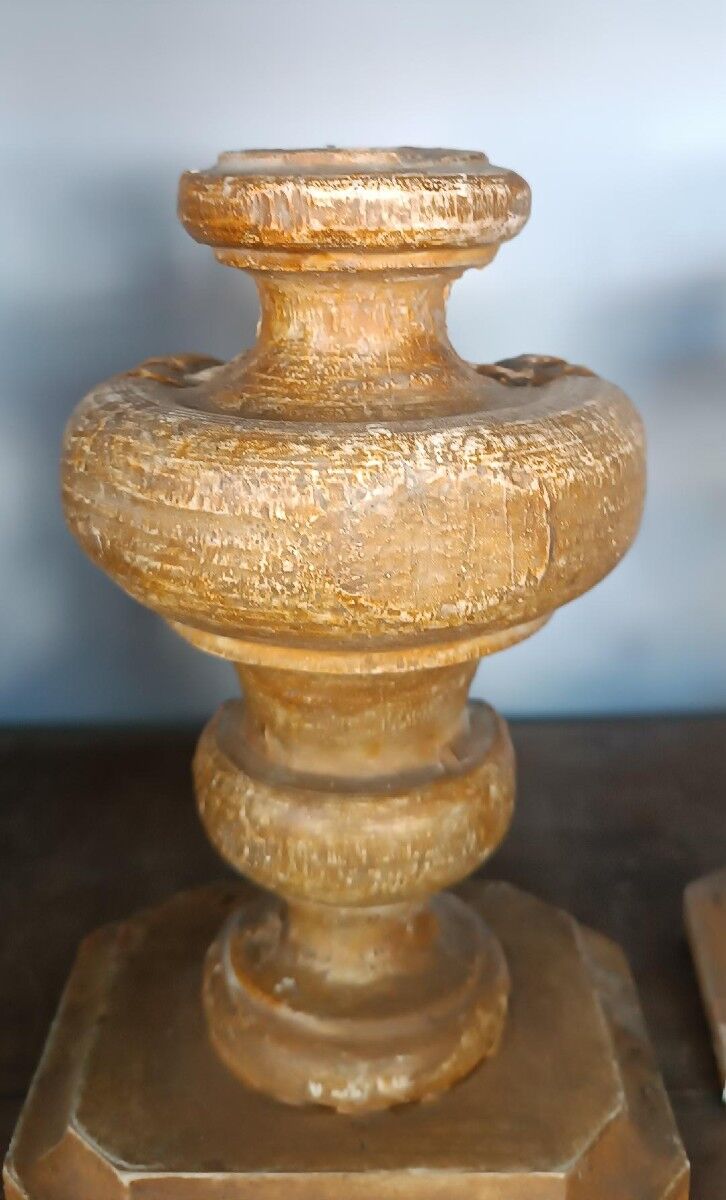 An antique pair of Louis XIV style paddle holders.