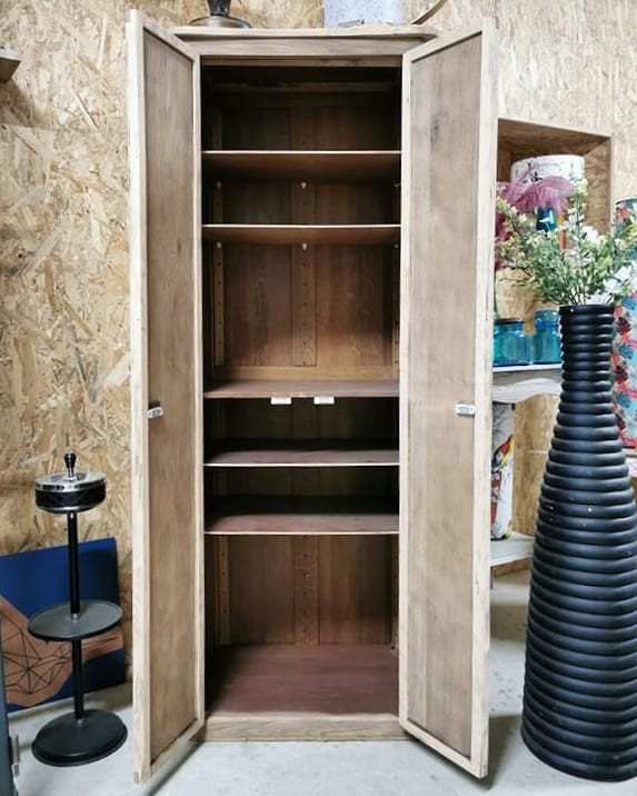 Narrow raw wooden cabinet