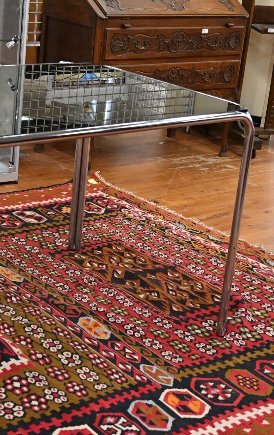 Vintage glass dining table with chrome legs.