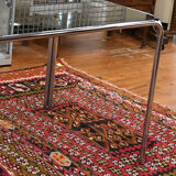 Vintage glass dining table with chrome legs.