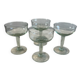 Set of four blown glass stemmed glasses.