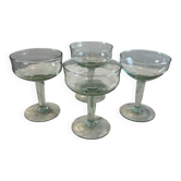 Set of four blown glass stemmed glasses.