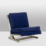 Pair of armchairs and pouf in chrome steel. 1970s, Valérian Rybar.