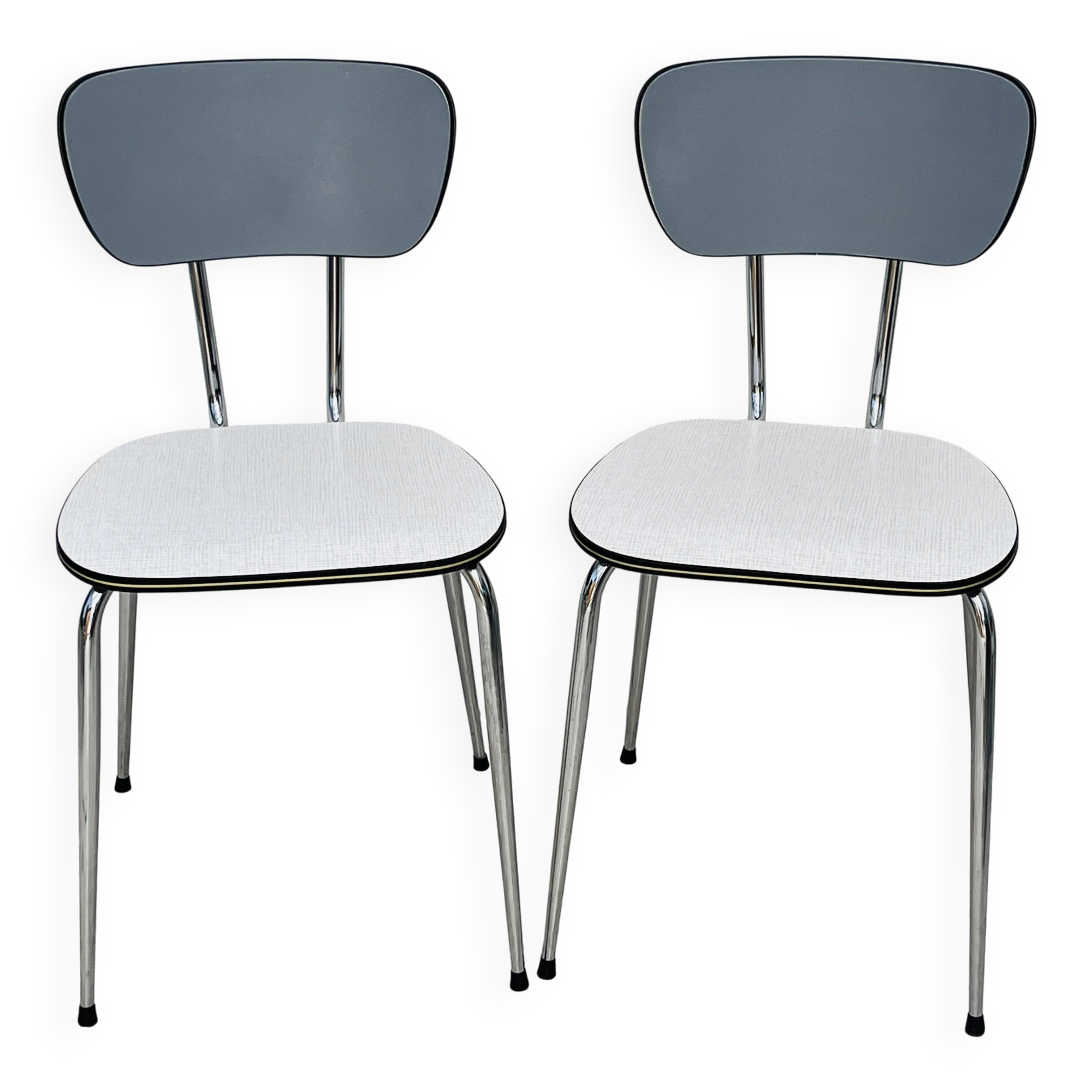 Set of two vintage grey Formica and chrome chairs.